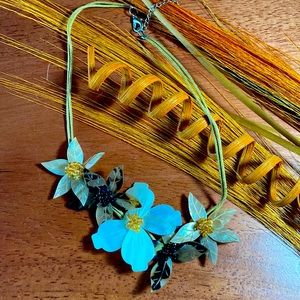 This Boho-style necklace in neutral colors is perfect for wedding season!